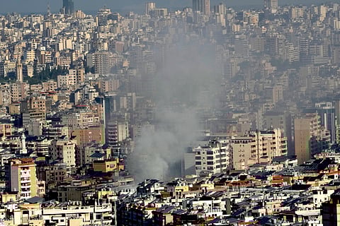 Smoke rises a neighborhood that was hit by an Israeli airstrike in Dahieh, Beirut, Lebanon, Wednesday, Oct. 2, 2024. 