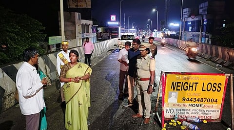 Kanniyakumari District Collector R Alagumeena inspecting the damaged portion of Marthandam over bridge on Wednesday night.