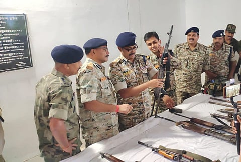 Bastar IG Sundarraj P (third from left) inspecting the weapons recovered from Maoists after the September 25 encounter in Narayanpur.