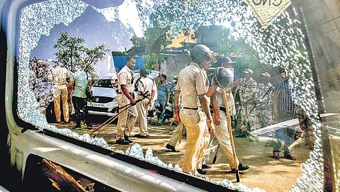 When the police officers were trying to persuade the crowd, the mob suddenly started throwing stones at the police personnel