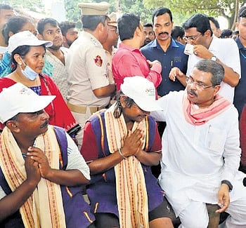 Pradhan with sanitation workers