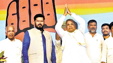 Chief Minister Siddaramaiah greets the gathering at a Swabhimana Samavesha at Manvi Town in Raichur district on Saturday.