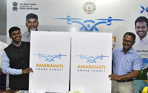 Principal secretary Infrastructure and Investments S Sureshkumar releases the flyer of Amaravati drone summit on Sunday. 