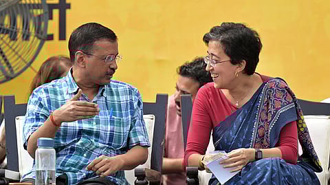 File - Delhi Chief Minister Atishi and AAP national convener Arvind Kejriwal during the 'Janta Ki Adalat' event, in New Delhi on Sunday, Oct. 6, 2024.