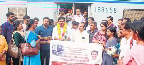 Mavelikkara MP Kodikunnil Suresh felicitated during the inaugural trip of the special Kollam-Ernakulam MEMU service, at Ettumanoor railway station on Monday.