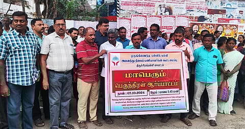 Tamil Nadu Block Resource Teacher Educators  Association staged a protest condemning the union government near the collectorate on Monday.