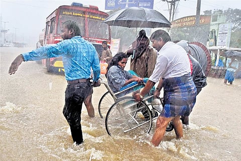 File picture of a patient being shifted to the Tambaram Government Hospital amidst heavy rains during the Northeast monsoon a few years ago.