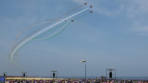 Indian Air Force's aerobatics team 'Surya Kiran' performs during an air show as part of the 92nd anniversary celebrations of IAF, at Marina Beach, Chennai on Sunday.