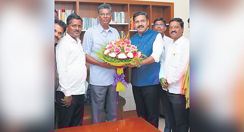 Karnataka BJP president BY Vijayendra greets PWD Minister Satish Jarkiholi in Bengaluru on Monday 