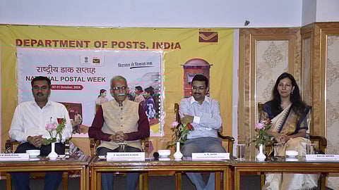 Panel presiding over the get-together held in honour of National Postal Week.
