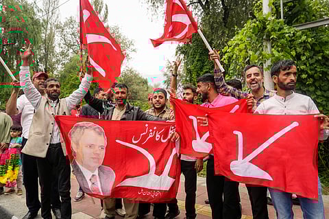 Congress party and National Conference supporters celebrate J&K Assembly poll results, in Srinagar, Tuesday, Oct. 8, 2024.