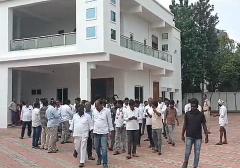 Congress leaders besiege the Gajwel MLA camp office on Monday.