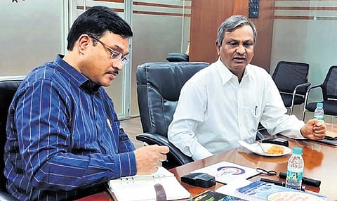 HYDRAA Commissioner AV Ranganath and ex-director of KSNDMC GS Srinivas Reddy in Hyderabad on Wednesday