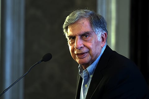 Ratan Tata sits in the cockpit of a F17 fighter plane during the Aero India 2011, India's biggest air show, at Yelahanka Air base in Bangalore.