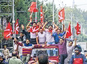 Jubilant National Conference supporters in Srinagar, after the results were announced on Tuesday 