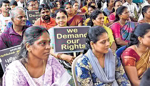 Various teachers’ and non-teaching staff associations staged a protest condemning the non-release of central funds at Valluvar Kottam on Wednesday
