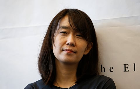 South Korean author Han Kang poses for the media during a news conference in Seoul, South Korea, Tuesday, May 24, 2016. Kang has won the Nobel Prize for Literature.