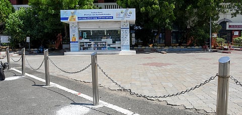 The barricaded portion of the space in front of the PMBJK outlet on Tiruchy railway junction premises
