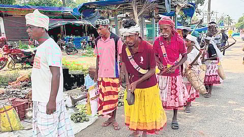 Santhals performing Dansaye at a market in Baripada town