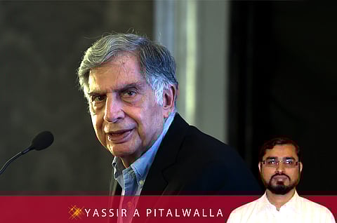 Ratan Tata sits in the cockpit of a F17 fighter plane during the Aero India 2011, India's biggest air show, at Yelahanka Air base in Bangalore.