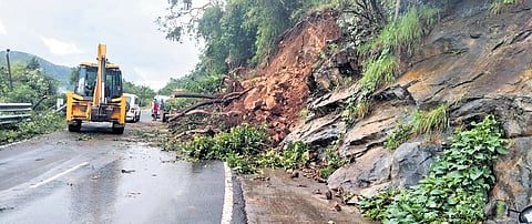 Landslides that occurred on the Anthiyur-Kollegal hill road on Saturday.