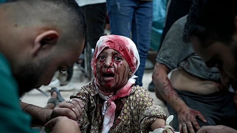 A Palestinian child wounded in the Israeli bombardment of the Gaza Strip is treated at a hospital in Deir al-Balah, Thursday, Oct. 10, 2024.