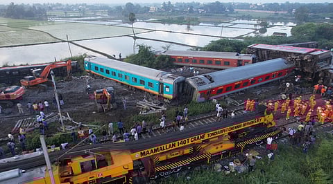 Indian railway workers and TNDRF restoring the train accident site.