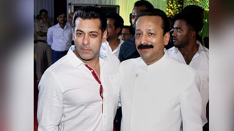 In this photo from June 24, 2017, then-Congress leader Baba Siddique poses with actor Salman Khan during the former's Iftar Party in Mumbai.