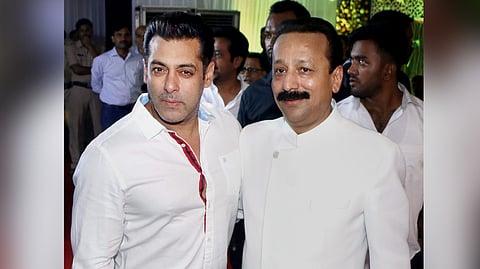 In this photo from June 24, 2017, then-Congress leader Baba Siddique poses with actor Salman Khan during the former's Iftar Party in Mumbai.