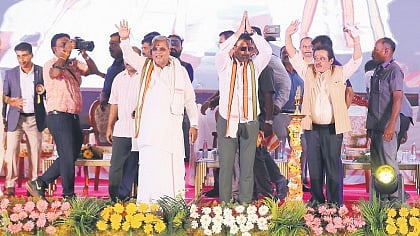 Chief Minister Siddaramaiah greets the gathering at a convention in Sandur, Ballari district, on Monday