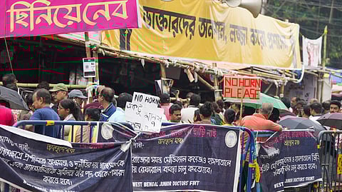 People gather at the site of the hunger strike by junior doctors in protest against the alleged sexual assault and murder of a trainee doctor, in Kolkata, West Bengal, Sunday, Oct. 13, 2024.