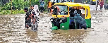 The Hennur Bande-Horamavu Road was flooded following incessant rainfall throughout on Tuesday in Bengaluru 
