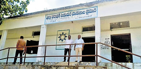 Teachers seen waiting for students at the school, following the imposition of Section 144 in Jainoor mandal of Kumurambheem Asifabad district on Wednesday