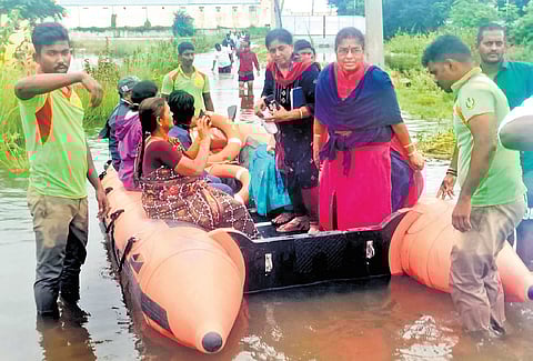 Families rescued by boat as water enters homes in Chennai 