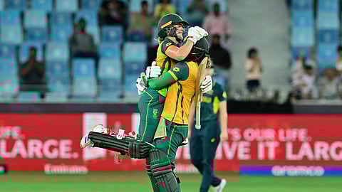 South Africa's Anneke Bosch (L) and Chloe Tryon celebrate their win at the end of the semi-finals of the ICC Women's T20 World Cup in Dubai.