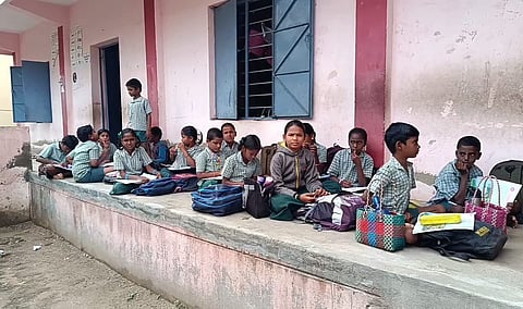 Students forced to sit in a outside of the class after wall collapsed from a government school in Palani in Dindigul district.
