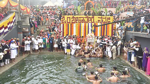 Devotees taking part in the Cauvery Tula Sankramana. 