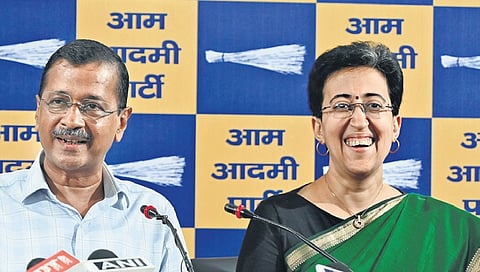 AAP national convener Arvind Kejriwal and Delhi CM Atishi address a press conference in New Delhi.