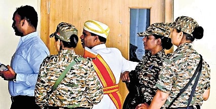 ED officials at the MUDA office in Mysuru on Friday.