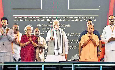 PM Narendra Modi with Governor Anandiben Patel, CM Yogi Adityanath in Varanasi.