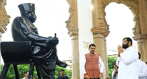 Maharashtra Chief Minister Eknath Shinde (R) and Deputy Chief Minister Devendra Fadnavis (C) pay tribute to RSS founder Keshav Baliram Hedgewar at the RSS Smriti Mandir in Nagpur on Aug 31, 2024. 