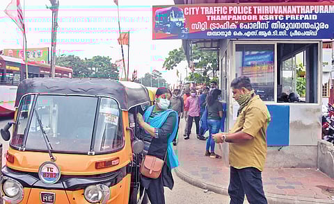 A passenger boarding an autorickshaw from the pre-paid auto counter at KSRTC Central Bus Terminal at Thampanoor on Friday 