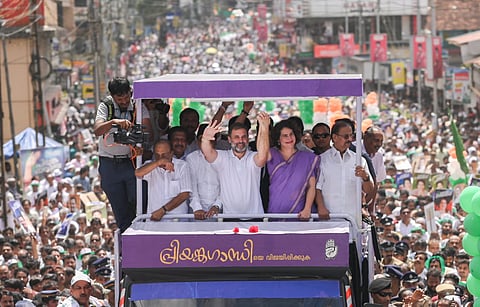 Congress candidate Priyanka Gandhi poses for a selfie with the students of WMO Arts and Science College at Muttil in Wayanad on Monday