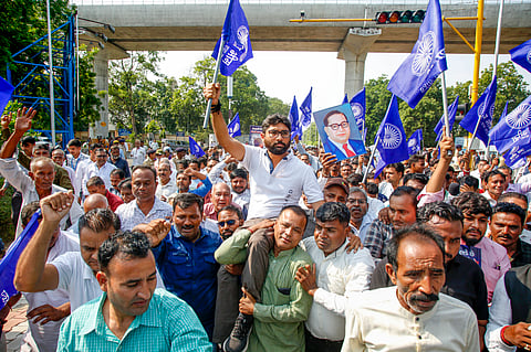 Congress MLA Jignesh Mevani along with members from the Dalit community stages a protest against IPS officer Rajkumar Pandian after a conflict between Mevani and Pandian, outside DGPs office in Gandhinagar, Gujarat, Wednesday, Oct 23, 2024.