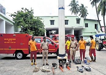 Fire service personnel with equipment for rescue and relief operations in Puri