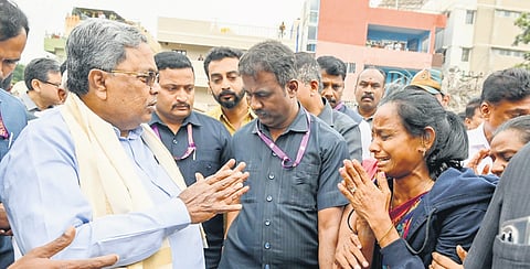 The corporation removing the unauthorised steps. 