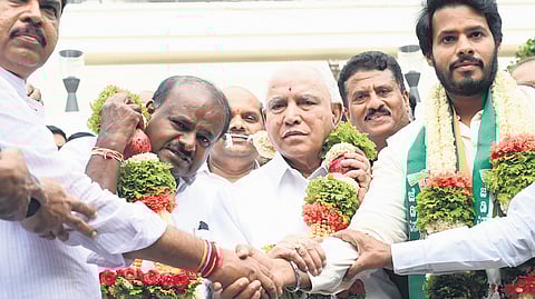 LoP in Assembly R Ashoka, Union Minister HD Kumaraswamy, former chief minister  BS Yediyurappa, and NDA candidate from Channapatna, Nikhil Kumaraswamy, pose for shutterbugs, in Bengaluru on Thursday