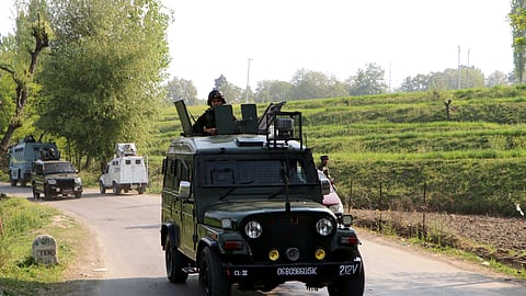 Security personnel guard the Tral area in Pulwama.