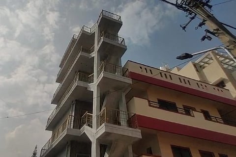 The tilted six floor building.