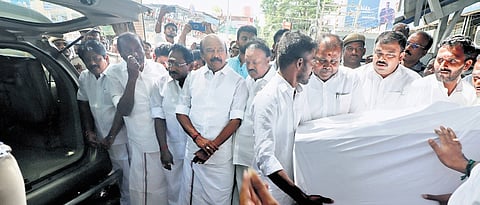 AIADMK members received the gold armour from a private bank on Friday